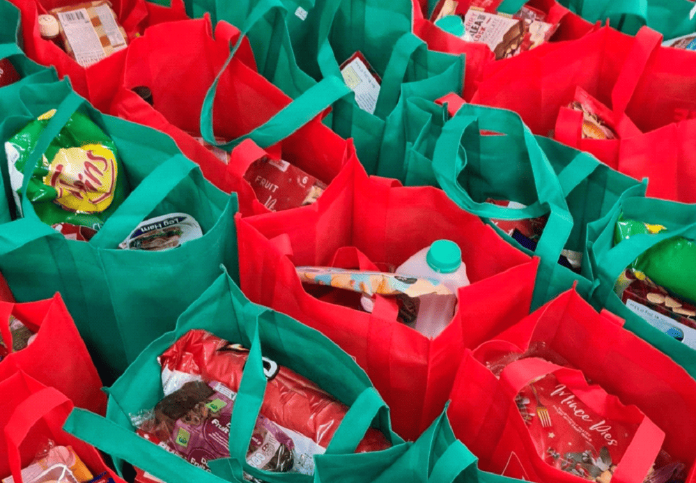 Multiple Shopping bags in rows representing inflation through increased retail price